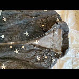 Black denim jacket with stars